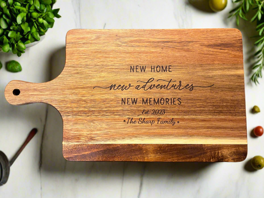 “New home, new adventure” Cutting board